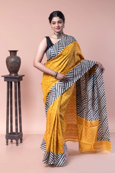 Buy this yellow Tussar Silk saree from Ramdhanu Ethnic -Ramdhanu Ethnic