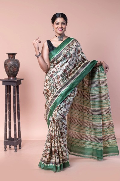 This Green and White saree is a perfect example of day wear -Ramdhanu Ethnic