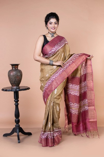 This beautiful maroon and dark beige saree is perfect for party wear -Ramdhanu Ethnic