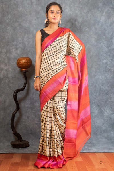 This orange tussar silk saree is a perfect for all kinds of celebrations -Ramdhanu Ethnic